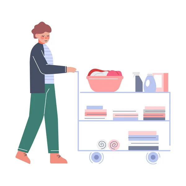 Guy doing Laundry, Young Man Pushing Cart with Clean Clothes at Public Laundrette Flat Style Vector Illustration - Stok Vektor