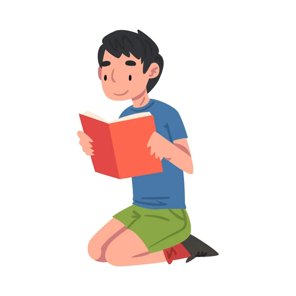 Ragazzo lettura libro seduto sul pavimento sulle ginocchia stile cartone animato vettoriale illustrazione su sfondo bianco — Vettoriale Stock