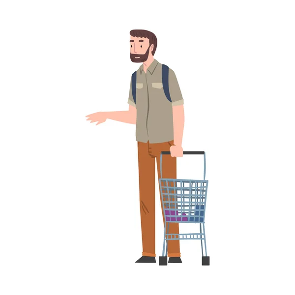 Junger bärtiger Mann steht mit Einkaufswagen, Kerl Einkaufen in Einkaufszentrum oder Supermarkt Cartoon Vector Illustration — Stockvektor
