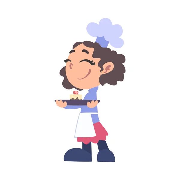 女の子シェフカップケーキとプレートを保持クック,白い帽子と4月を身に着けているかわいい子調理師文字キッチン漫画スタイルのベクトルイラスト上のおいしい料理を調理 — ストックベクタ