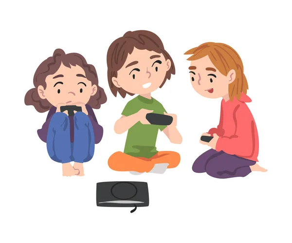 Cute Girls Sitting on Floor Παίζοντας Video Game, Τα παιδιά διασκεδάζουν μαζί με τον υπολογιστή παιχνιδιών Cartoon Style Εικονογράφηση διάνυσμα — Διανυσματικό Αρχείο