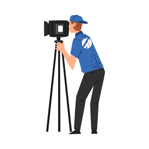 Male Cameraman Shooting with Video Camera on Tripod, Television Industry Concept Cartoon Style Vector Illustration — Stock Vector