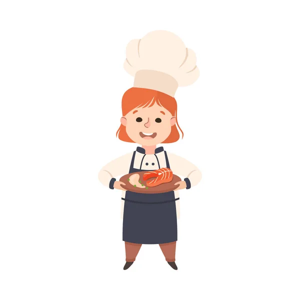 Cute Girl Chef Cook Holding Platter con filete de salmón, Chico sonriente en uniforme de chef Cocinar en la cocina Estilo de dibujos animados Vector Ilustración — Vector de stock