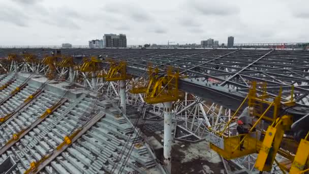 Aerial shot of roof of a football stadium construction — Stock Video