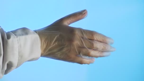 Hand of nurse wearing rubber glove. use for healthy or medic. — Stock Video