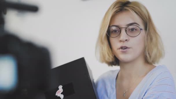 Close up of Happy beautiful woman unboxing gifts from brand or her subscribers. — Stock Video