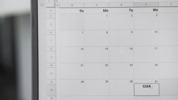 Escribir DÍA DE LIMPIEZA el 31 en el calendario para recordar esta fecha . — Vídeo de stock