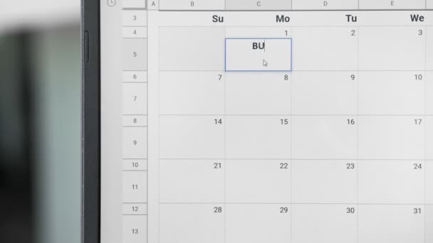 Написання BUSSINES MEETING на 1st в календарі, щоб пам'ятати цю дату . — стокове відео