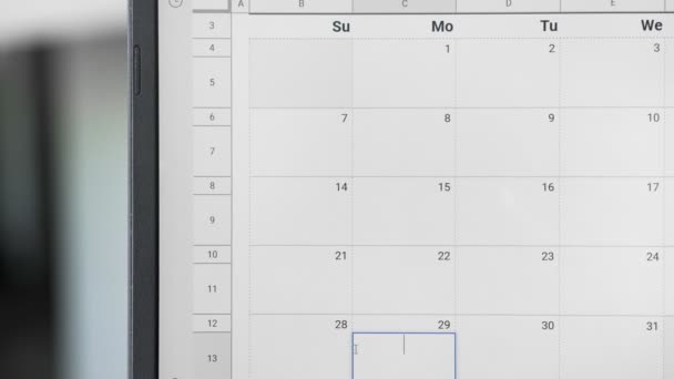 Menulis BUSSINES MEETING pada tanggal 29 pada kalender untuk mengingat tanggal ini . — Stok Video