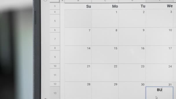 Написание бизнес-встречи 31-го числа по календарю, чтобы запомнить эту дату . — стоковое видео