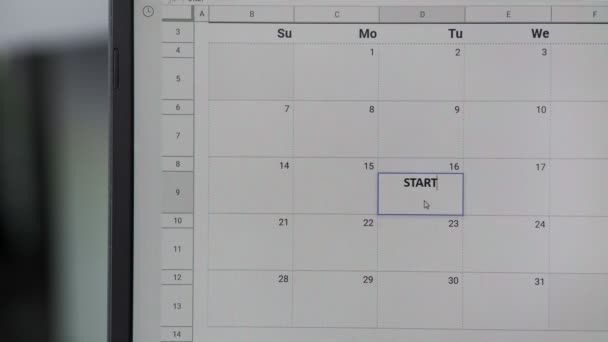 Writing START JOB on 16th on calendar to remember this date. — Stock Video