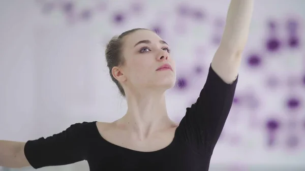 Young attractive ballerina practising ballet moves — Stock Photo, Image