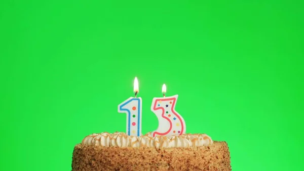 Encendiendo una vela de cumpleaños número cuatro en un delicioso pastel, pantalla verde 13 — Foto de Stock