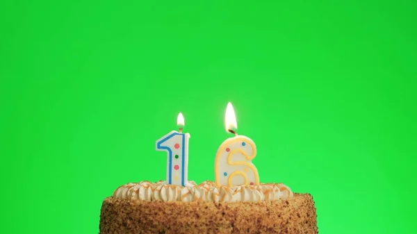 Lighting a number four birthday candle on a delicious cake, green screen 16 Stock Photo