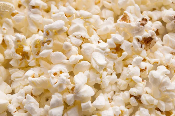 Closeup of popcorn, textured background — Stock Photo, Image