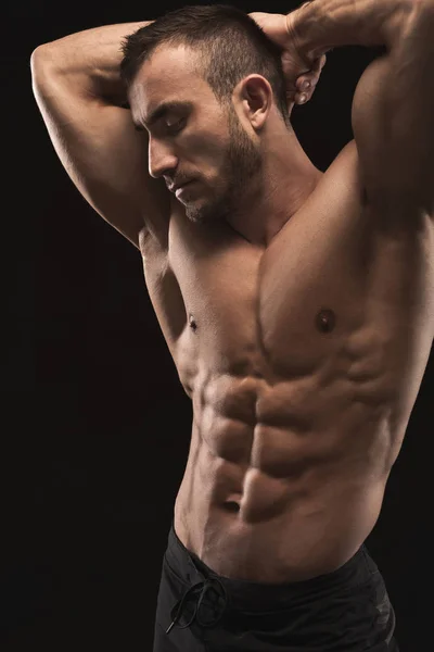 Fuerte atlético hombre muestra desnudo muscular cuerpo —  Fotos de Stock