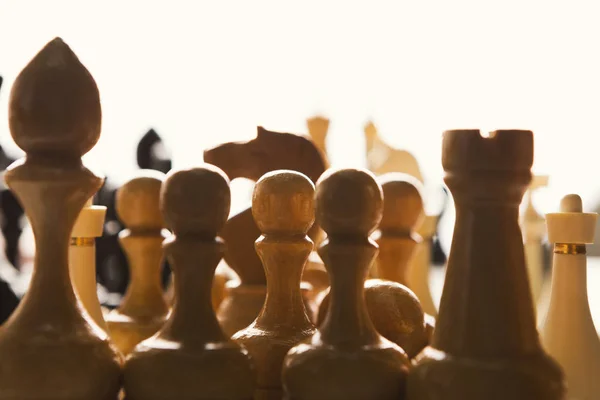 Silhouettes of chess figures on white background — Stock Photo, Image