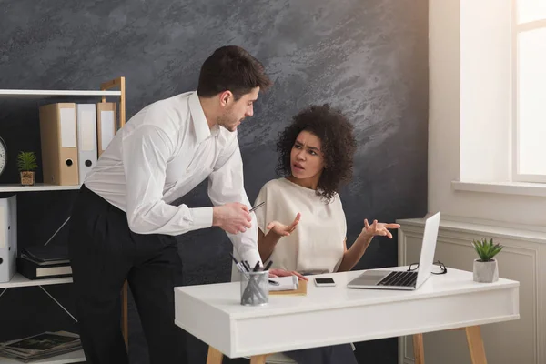 Couple of business partners work at modern office