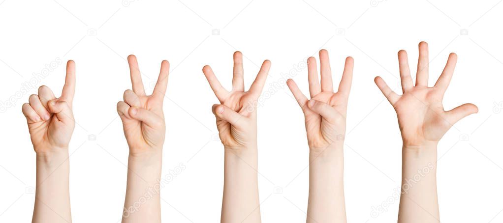 Set of child hands showing figures, counting