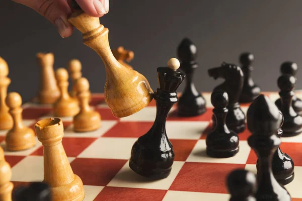 Hand of player chess board game putting white pawn — Stock Photo, Image