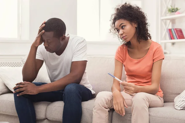 Sad black couple after pregnancy test result — Stock Photo, Image