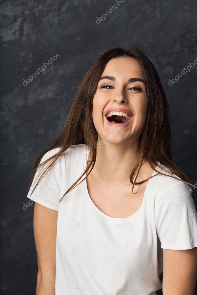 Young laughing attractive woman portrait