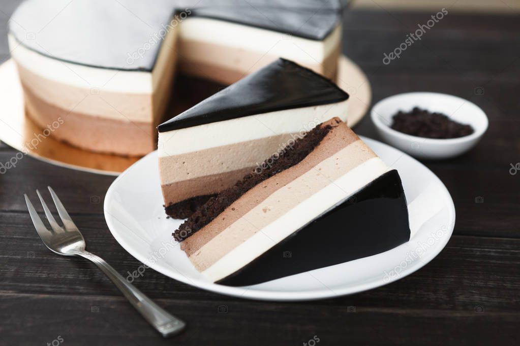 Triple chocolate layer mousse cake with glaze