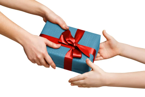 Children hands with gift box isolated on white — Stock Photo, Image