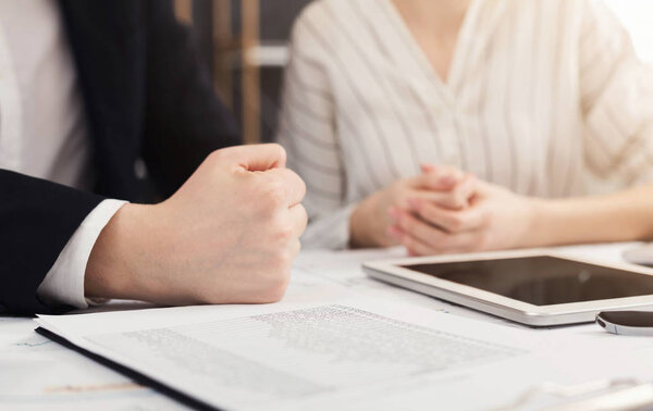 Man punches the table with his fist