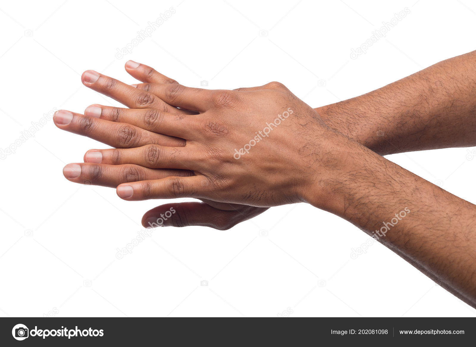 Zwarte man toepassen van handcrème bij witte geïsoleerde achtergrond ⬇ Stockfoto, rechtenvrije foto door Milkos #202081098