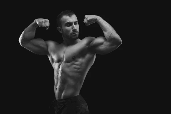 Ισχυρή Αθλητικός άνδρας showes γυμνή μυώδες σώμα — Φωτογραφία Αρχείου
