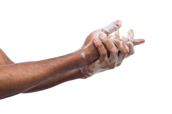 Schwarzer Mann wäscht Hände isoliert auf weißem Hintergrund — Stockfoto