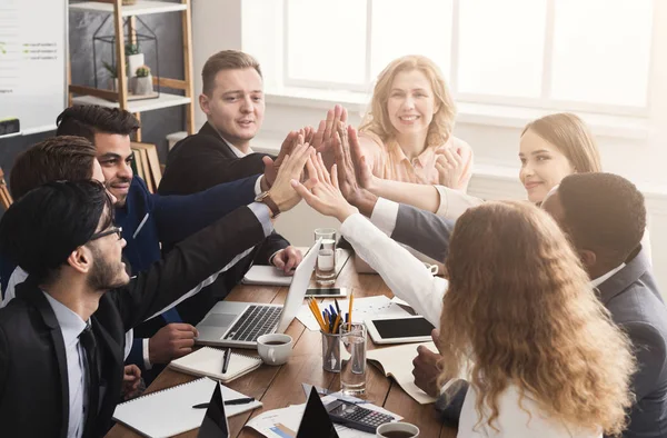 Successful business team is giving high five — Stock Photo, Image