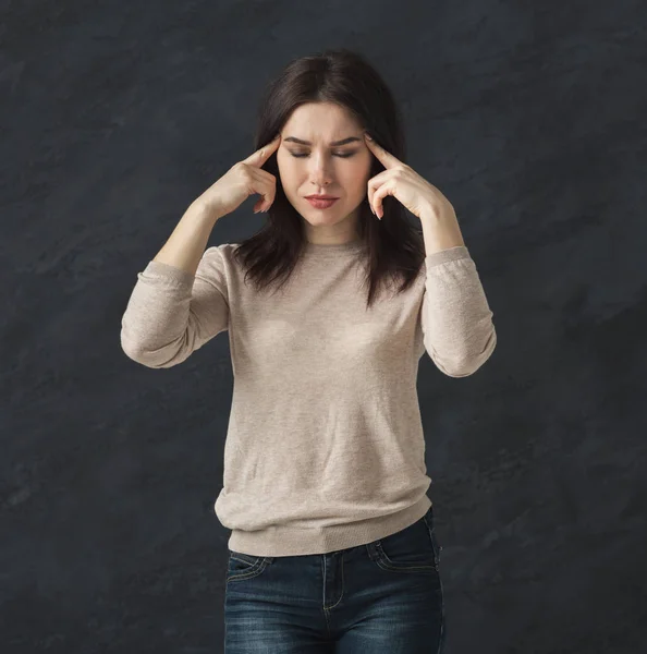 Portrait of young tired woman has headache — Stock Photo, Image