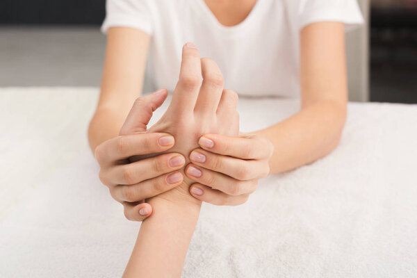Hand massage closeup, acupressure