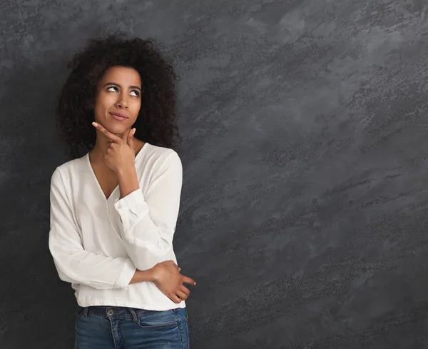 Young african-american woman thinking — Stock Photo, Image