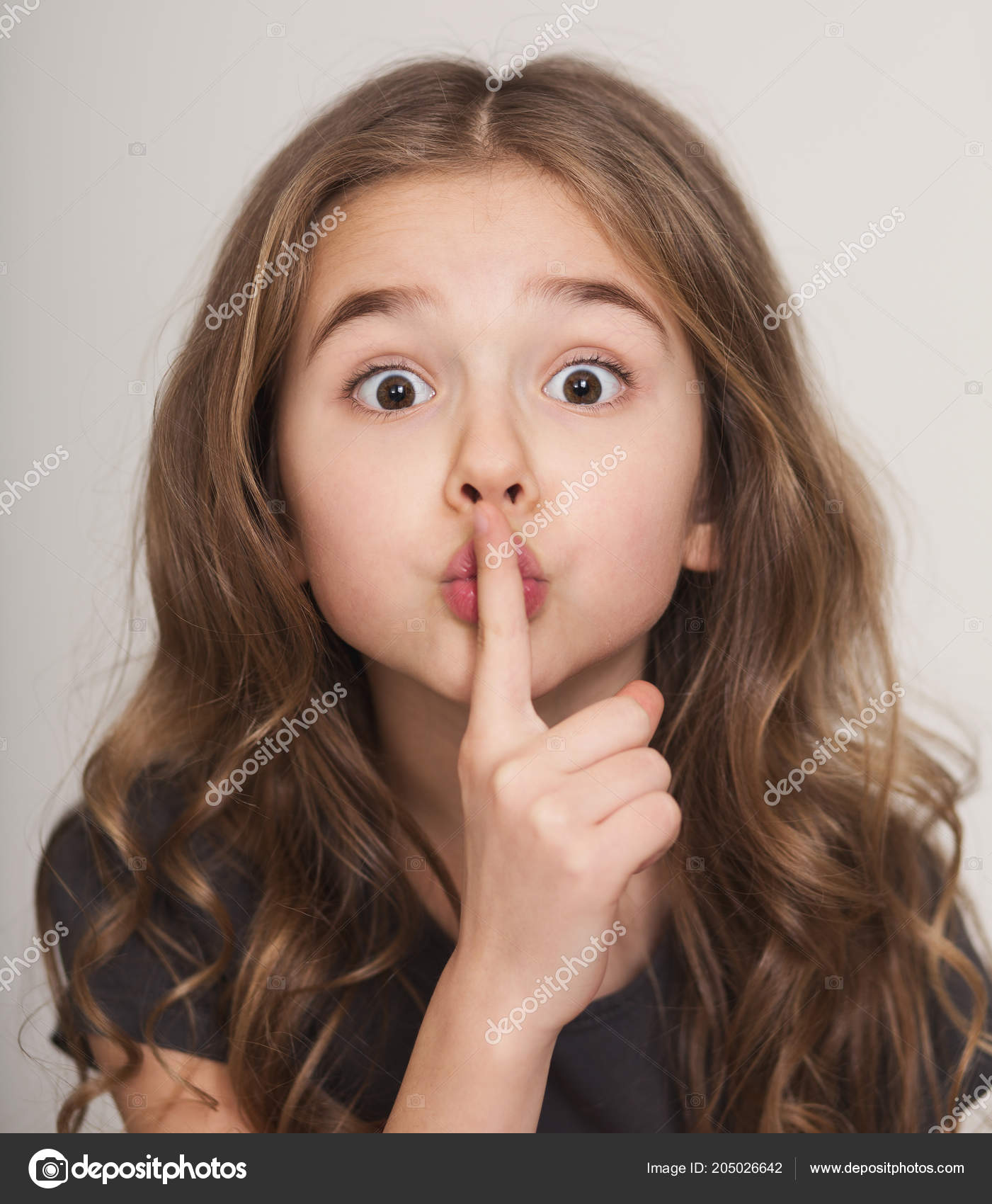 Beautiful Little Girl With Finger On Lips F Stock Photo Image By C Milkos