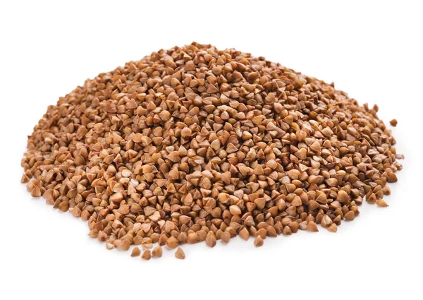 Pile of dry buckwheat isolated on white — Stock Photo, Image