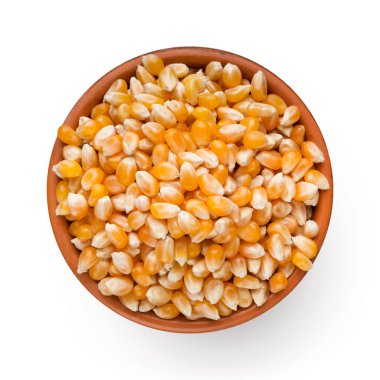 Beyaz arka plan üzerinde kase kuru Mısır