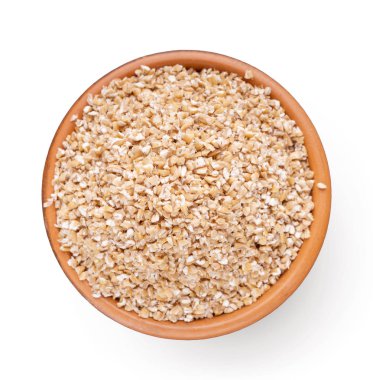 Kase üzerinde beyaz izole arpa ezmesi ile üstten görünüm