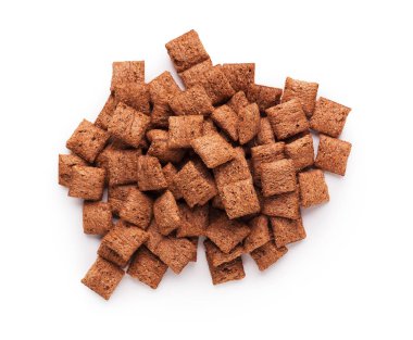 Beyaz zemin üzerine çikolata yastık hububat yığını