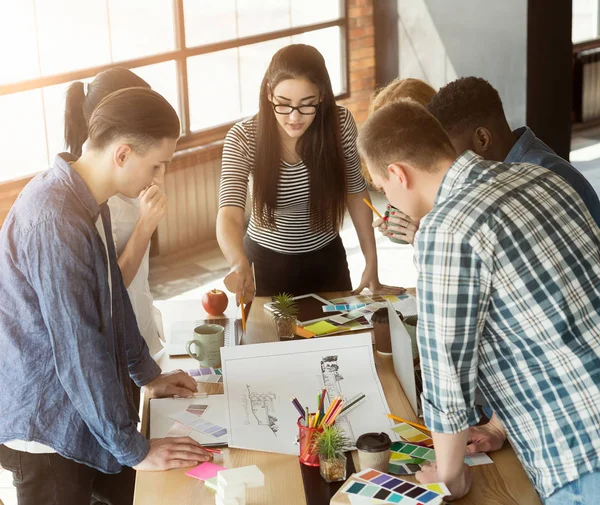 Group of young colleagues brainstorming in office — Stock Photo, Image