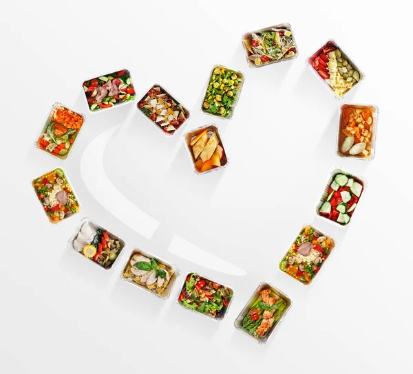 Telaio fatto di scatole di cibo sano su sfondo whie — Foto Stock