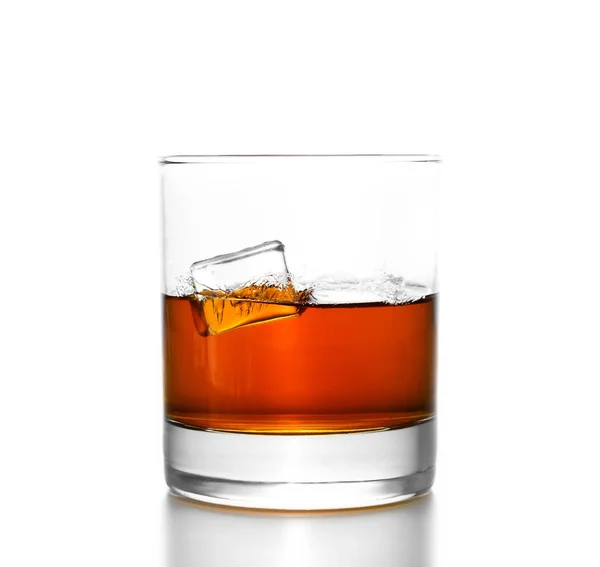 Whisky glass with splashes, isolated on white — Stock Photo, Image
