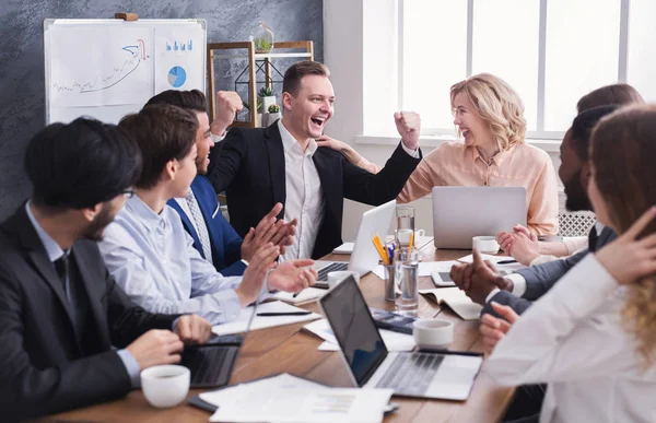 Business people congratulate colleague with his success — Stock Photo, Image