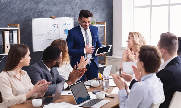 Business people applauding for colleague after presentation — Stock Photo, Image