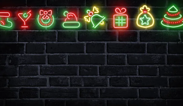 Conjunto de letreros de Navidad de neón en la pared de ladrillo —  Fotos de Stock