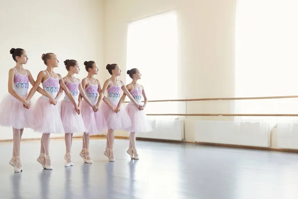 Ballerinas rehearsing dance of little swans in class — Stock Photo, Image