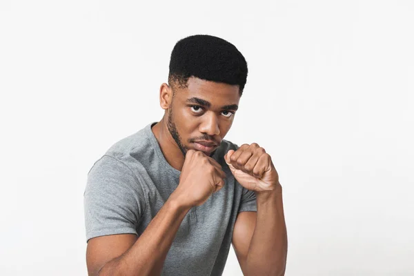 African-american man with fight gesture on white background — Stock Photo, Image