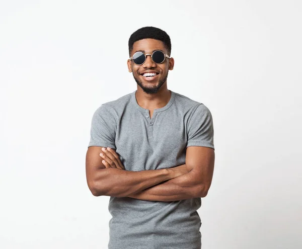 Cheerful young african-american man on white background — Stock Photo, Image